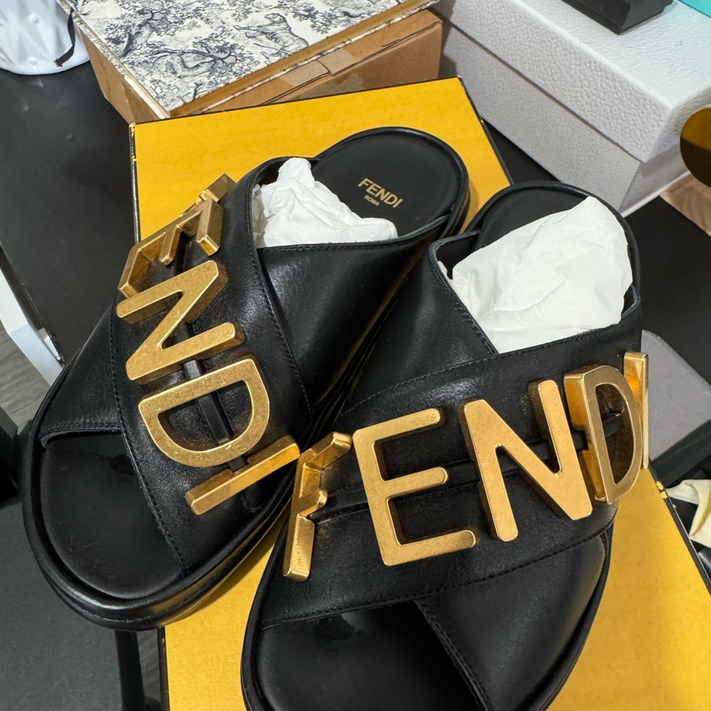 Fendi Black and Gold Mules with Bold Branding